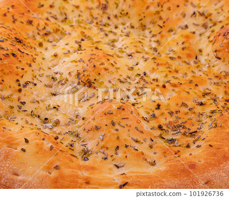 Italian focaccia bread close up background Italian focaccia bread close up background 101926736