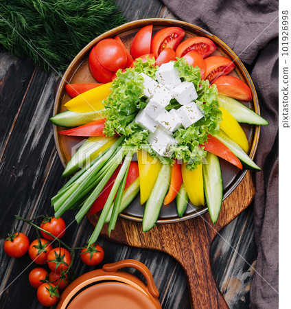 chopped vegetables with goat cheese top view chopped vegetables with goat cheese top view 101926998