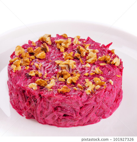 Traditional Beetroot salad with nuts on plate Traditional Beetroot salad with nuts on plate 101927326