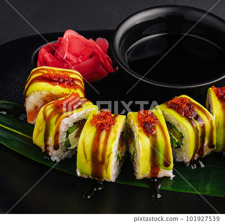 Green dragon sushi roll with eel, avocado, cucumber 101927539
