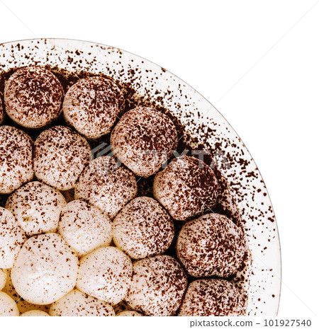 Tiramisu cake with chocolate decor isolated 101927540