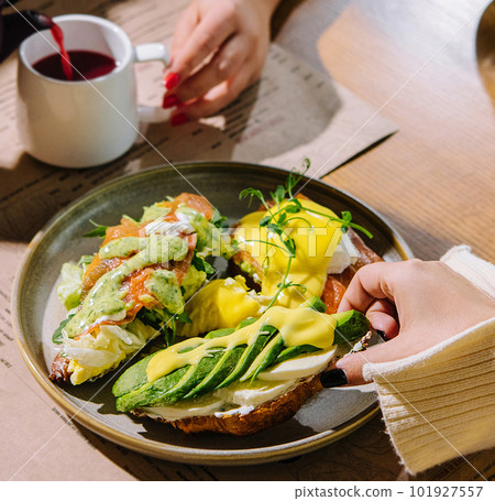 girls have breakfast in a cafe girls have breakfast in a cafe 101927557