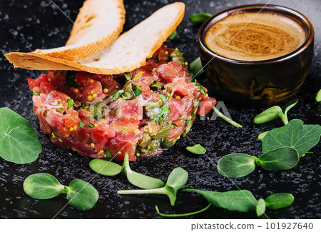 Raw beef tartar snack with capers Raw beef tartar snack with capers 101927640