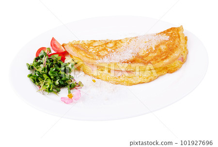 Omelette with ham cherry tomatoes on plate 101927696