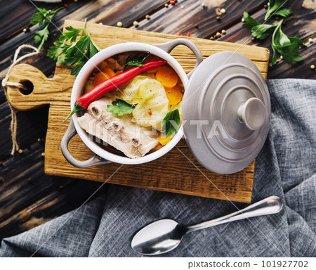Pickled cabbage soup with carrots and pork ribs 101927702