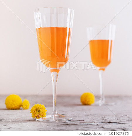 Mimosa alcohol cocktail with orange juice and dry champagne 101927875