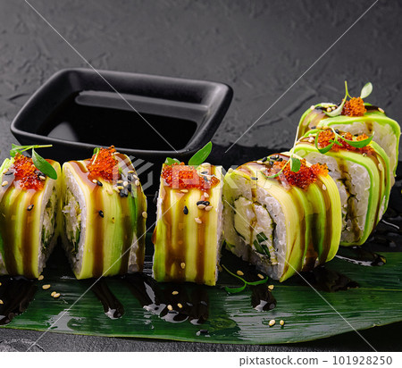 Sushi cheese rolls on black slate 101928250