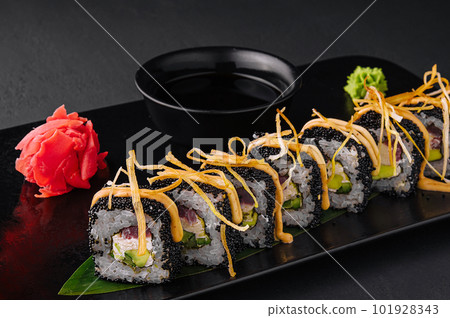 Sushi rolls with tuna and black caviar Sushi rolls with tuna and black caviar 101928343