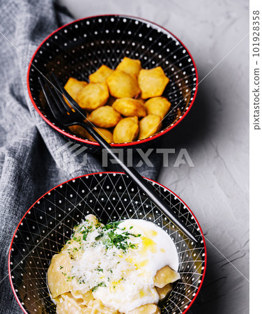 fried and boiled dumplings on stone fried and boiled dumplings on stone 101928358