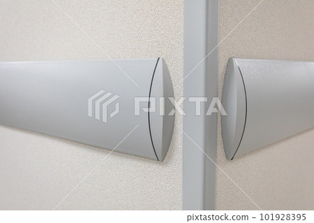 Wall bumper installed on the corridor wall in the building. 101928395