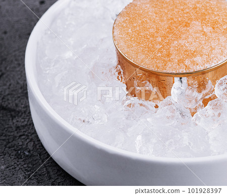 Pike caviar on ice close up 101928397