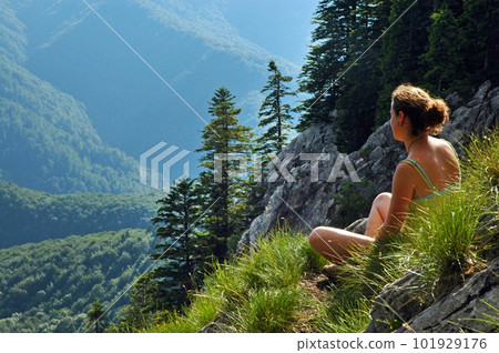 Woman admiring the landscape Woman admiring the landscape 101929176