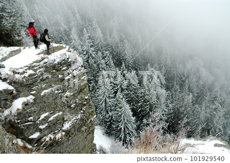 Trekkers on the summit at winter 101929540