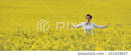 Young woman enjoying freedom in the outdoors 101929647