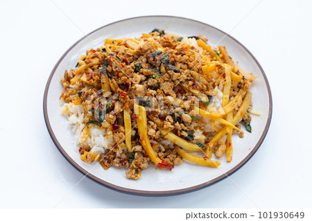 Rice with spicy stir fried pork with holy basil and preserved bamboo shoot Rice with spicy stir fried pork with holy basil and preserved bamboo shoot 101930649