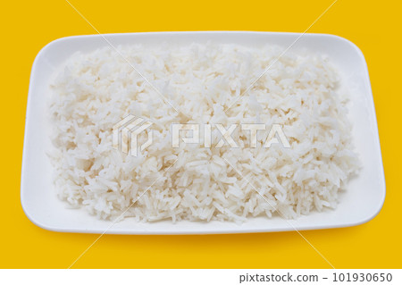 Dish of rice on yellow background. 101930650