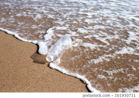 Plastic bottle on the beach 101930711