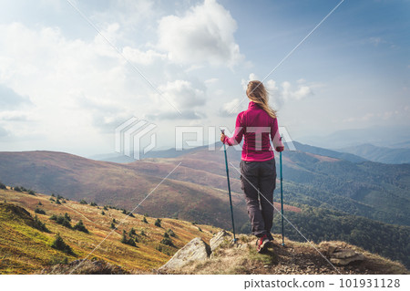 Young woman n the top of the mountains Young woman n the top of the mountains 101931128