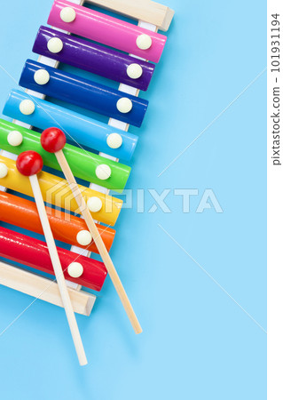 Colorful xylophone on blue background. 101931194