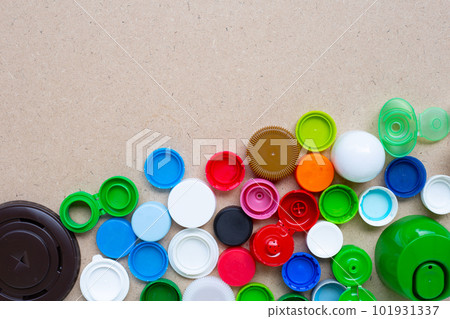 Colorful plastic bottle caps and plastic glass lid 101931337