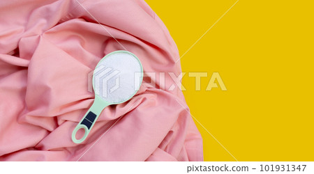 Detergent powder in measuring spoon on cloth before washing. Laundry concept. 101931347