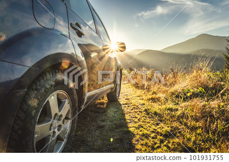 car for traveling with a mountain road 101931755