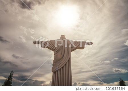 Jesus Christ with open arms statue. dramatic sky Jesus Christ with open arms statue. dramatic sky 101932164