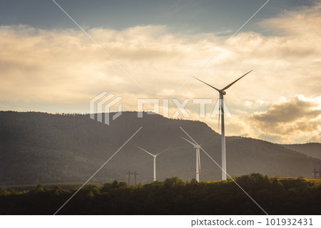 Wind turbines at the mountain landsape. Green power energy generation. Wind turbines at the mountain landsape. Green power energy generation. 101932431
