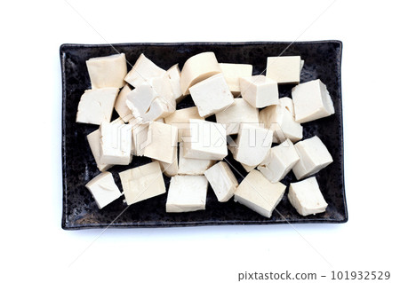 White tofu in black plate on white background White tofu in black plate on white background 101932529
