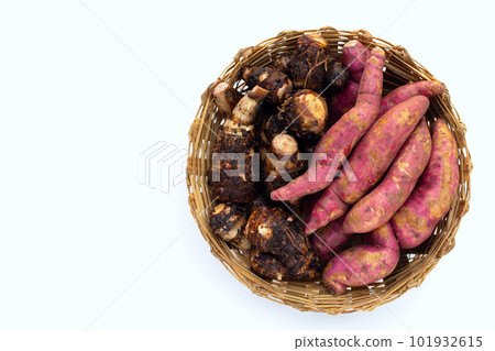 Sweet potato with taro in bamboo basket on white background. 101932615