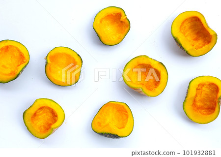 Green pumpkin pieces on white. 101932881