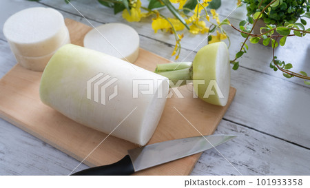 Cutting a radish image 101933358