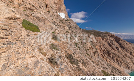 The Hozoviotissa Monastery standing on a rock over the Aegean sea in Amorgos island timelapse hyperlapse, Greece. 101934207
