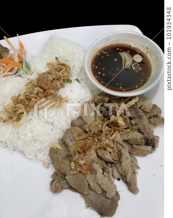Top view of Vietnamese Grilled Pork with Vermicelli, focus selective Top view of Vietnamese Grilled Pork with Vermicelli, focus selective 101934348