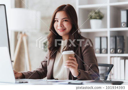 Accountant woman working on laptop and do document, tax, exchange, research, accounting and Financial advisor concept Accountant woman working on laptop and do document, tax, exchange, research, accounting and Financial advisor concept 101934393