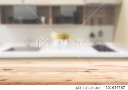 Blur sink counter space in modern home kitchen with wooden foreground for advertising montage background 101936367