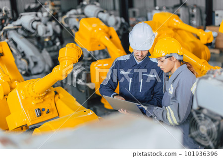 engineer team working together inspection quality robot arm in robot assembly industry plant engineer team working together inspection quality robot arm in robot assembly industry plant 101936396