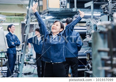 Happy female worker at the factory 101937099