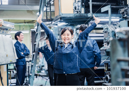 Happy female worker at the factory 101937100