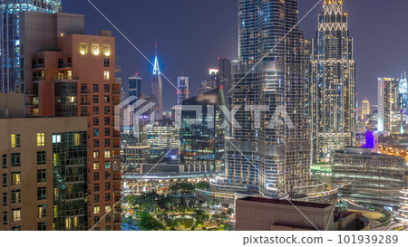 Aerial view of Dubai International Financial Centre district skyscrapers day to night timelapse 101939289