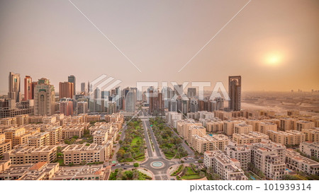 Sunrise over skyscrapers in Barsha Heights district and low rise buildings in Greens district aerial timelapse. Sunrise over skyscrapers in Barsha Heights district and low rise buildings in Greens district aerial timelapse. 101939314