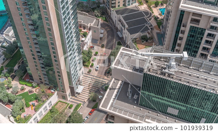 Dubai downtown near fountains and modern futuristic architecture aerial timelapse 101939319