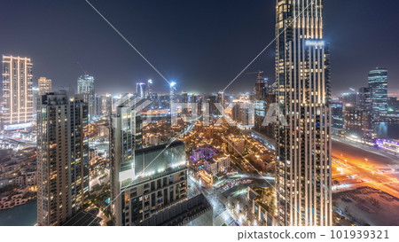 Aerial panoramic view of a big futuristic city day to night timelapse. Business bay and Downtown 101939321