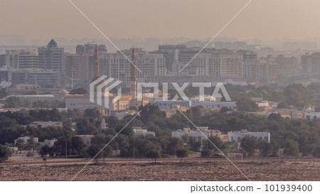 Aerial view of mosque and neighbourhood Deira on a background timelapse. Dubai, United Arab Emirates 101939400