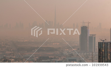 Dubai Downtown skyline row of skyscrapers with tallset tower aerial morning timelapse. UAE Dubai Downtown skyline row of skyscrapers with tallset tower aerial morning timelapse. UAE 101939543