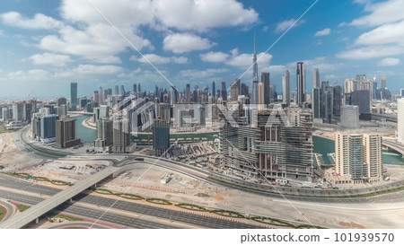Panorama showing skyline of Dubai with business bay and downtown district timelapse. Panorama showing skyline of Dubai with business bay and downtown district timelapse. 101939570