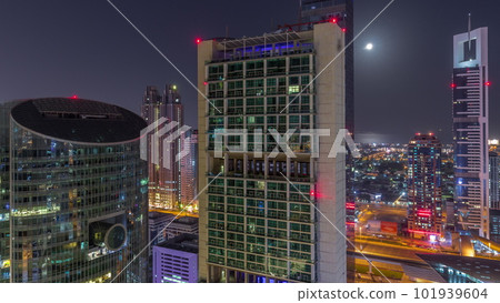 Dubai international financial center skyscrapers aerial all night timelapse. 101939604