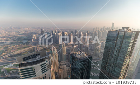 Panorama of Dubai Marina with JLT skyscrapers and golf course timelapse, Dubai, United Arab Emirates. 101939735