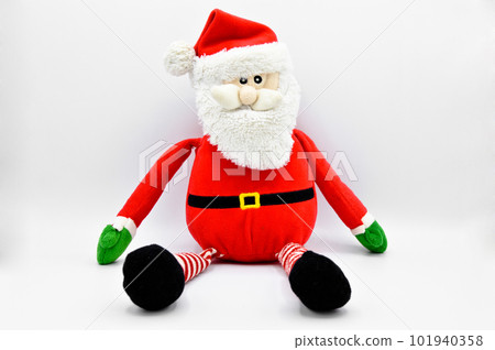 Santa claus figure from plush toy used in new year and christmas celebrations, isolated on white background Santa claus figure from plush toy used in new year and christmas celebrations, isolated on white background 101940358