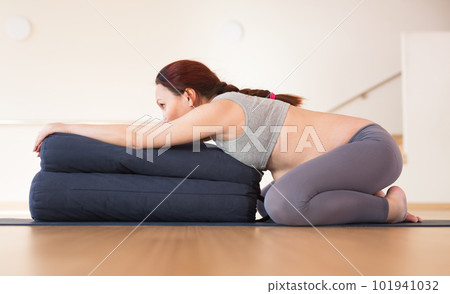 Woman does yoga in the gym.pregnant woman does yoga in the gym 101941032